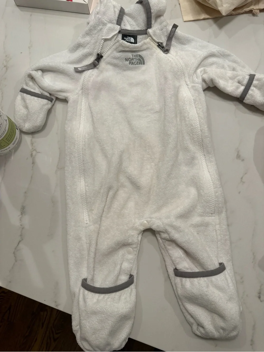 The North Face White Fleece Baby One-Piece with Gray Trim